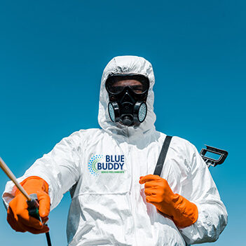 selective focus of exterminator in uniform and latex gloves hold selective focus of exterminator in uniform and latex gloves holding spray outside